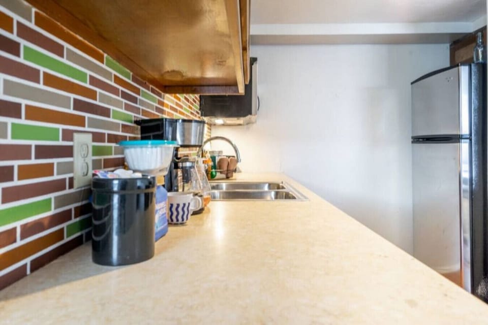 Your daily dose of caffeine is on us—  coffee maker and complimentary coffee!