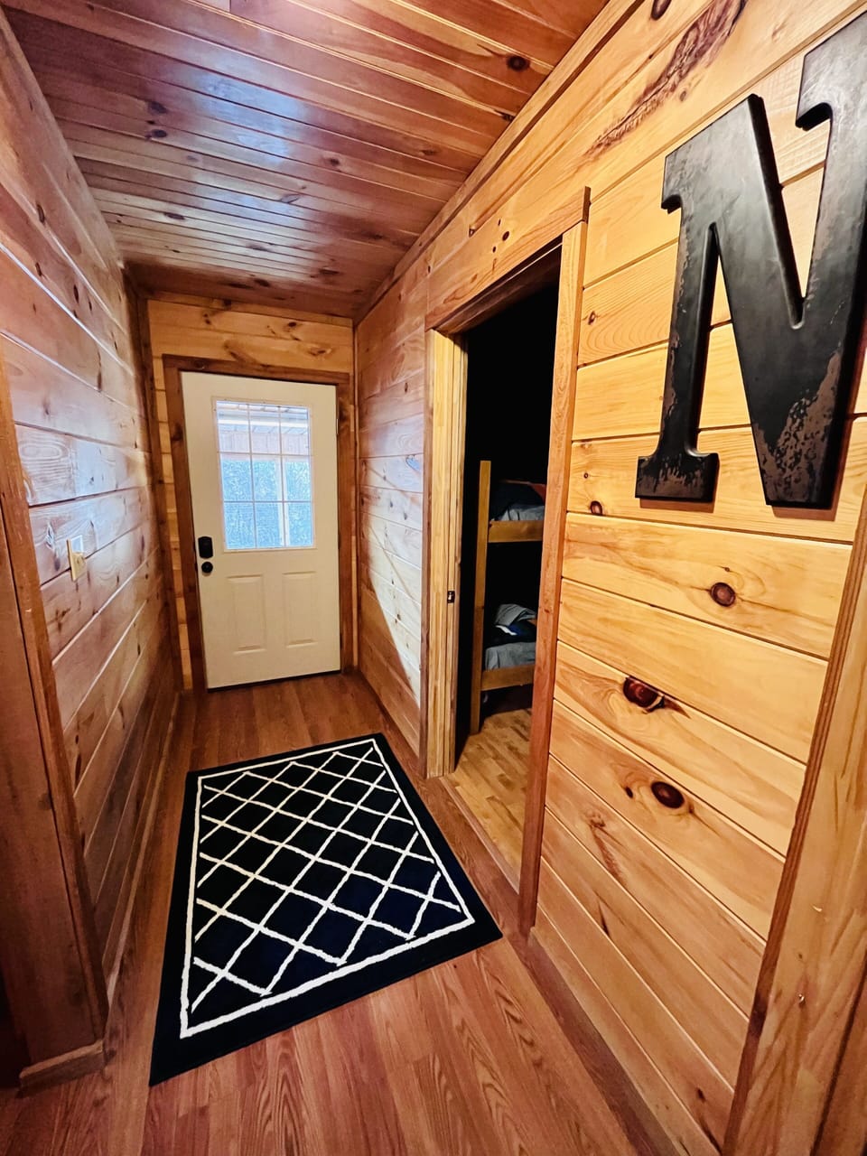 Downstairs doorway to the covered driveway.