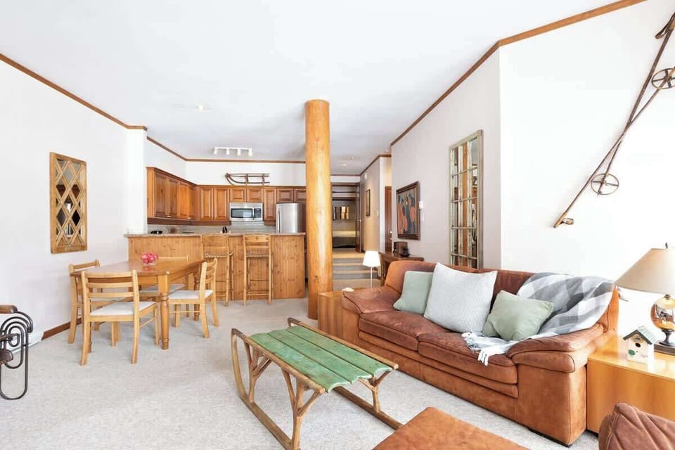 - Spacious open-concept living area blending comfort and rustic charm  
- Plush leather seating and handcrafted wood details throughout  
- Ideal for family getaways and Whistler ski vacations  