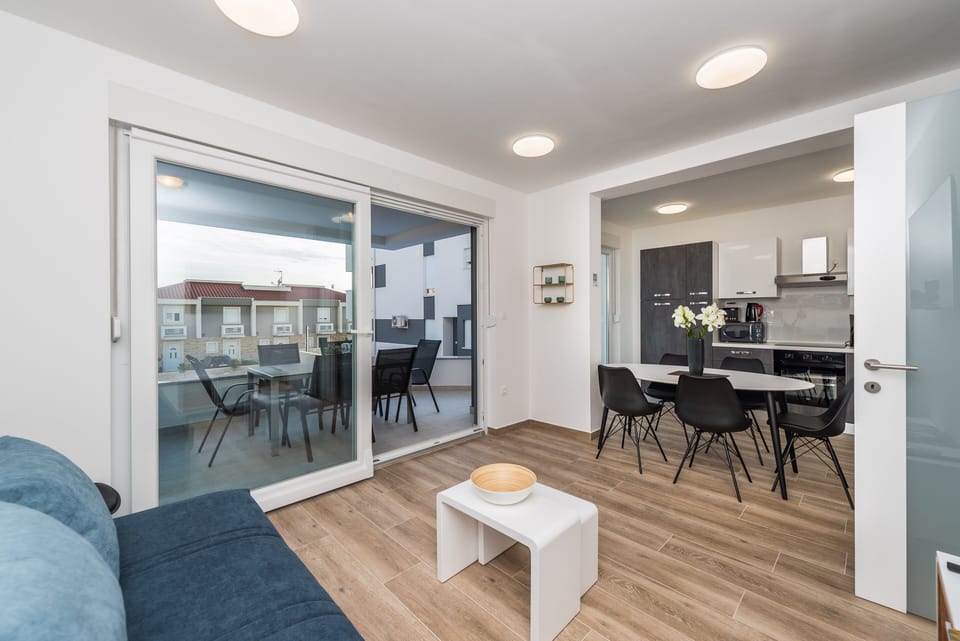 Deluxe Apartment, 2 Bedrooms, Balcony, Pool View | Living area | Smart TV