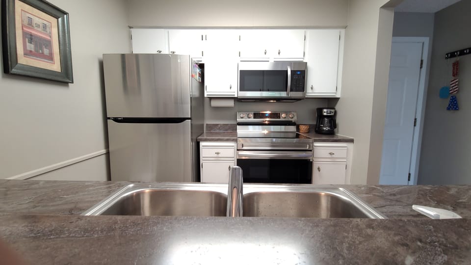 Kitchen from view of Breakfast Bar