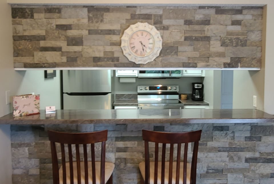 Breakfast Bar with Kitchen in background
