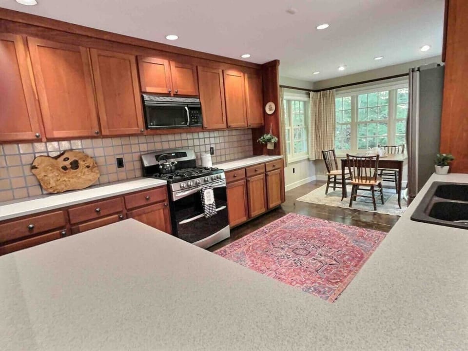 Enter our large and fully stocked kitchen, where modern comforts meet timeless charm.