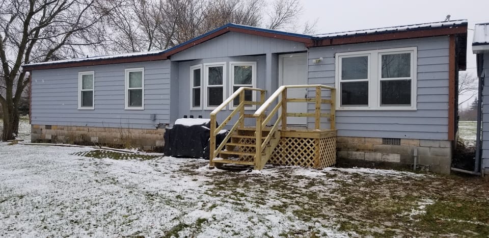Back view of Cottage L.  Grill/smoker available to both cottages.