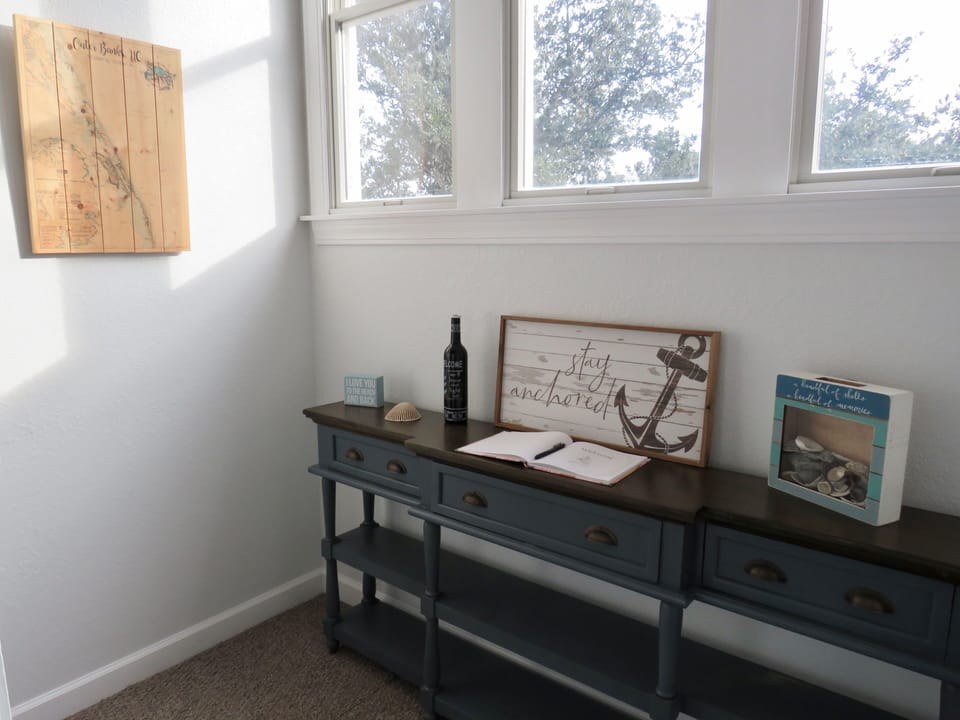 Stairs Landing - Be sure to stop on this large landing to sign the guest book.
