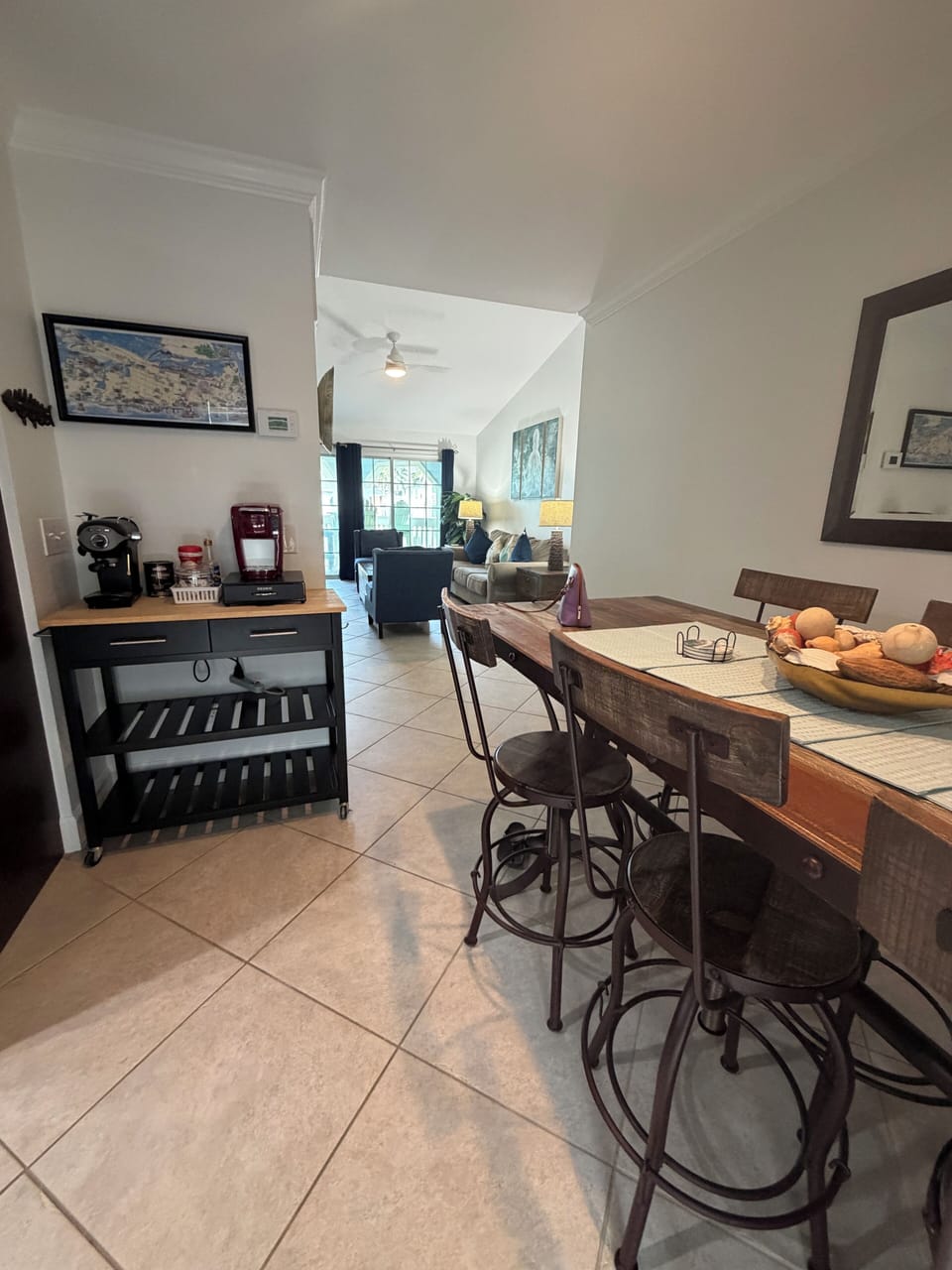 Dining table with enough space to use as an “office” area. Coffee station. 