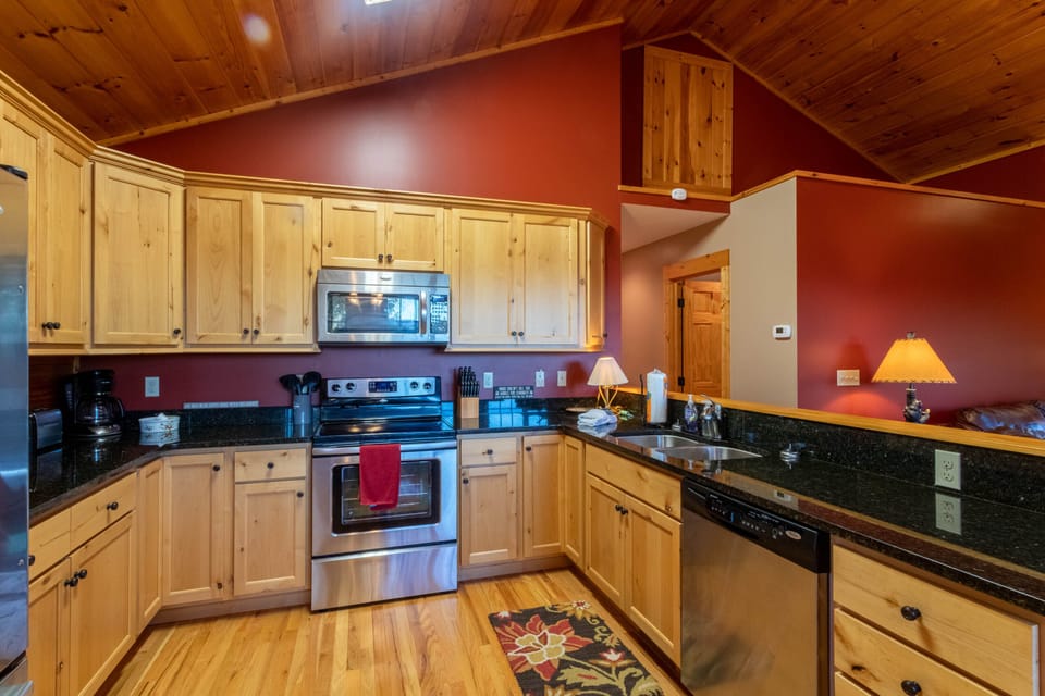 A fully equipped kitchen at Firefly Cabin, ready for home-cooked mountain meals after a day on the slopes.