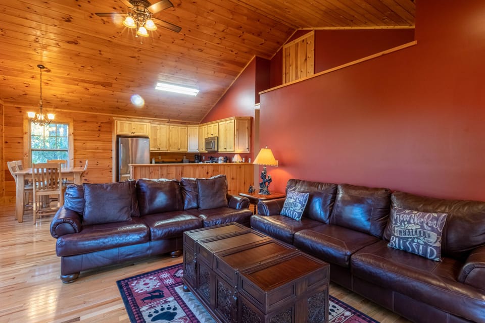 Room to spread out and relax. Firefly Cabin's open layout keeps everyone connected from the living room to the kitchen.