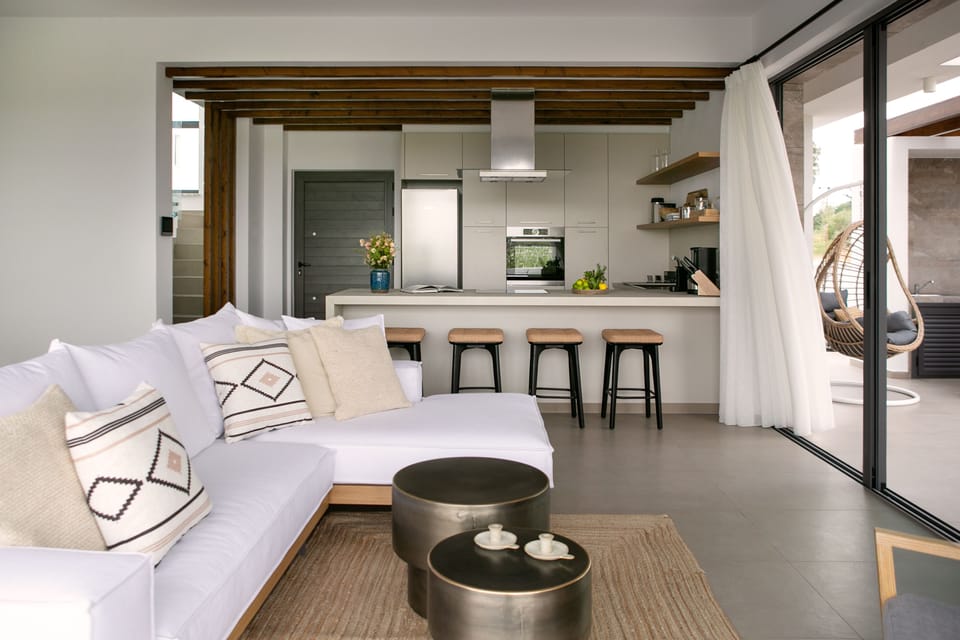 Villa | Living area | 43-inch TV with cable channels
