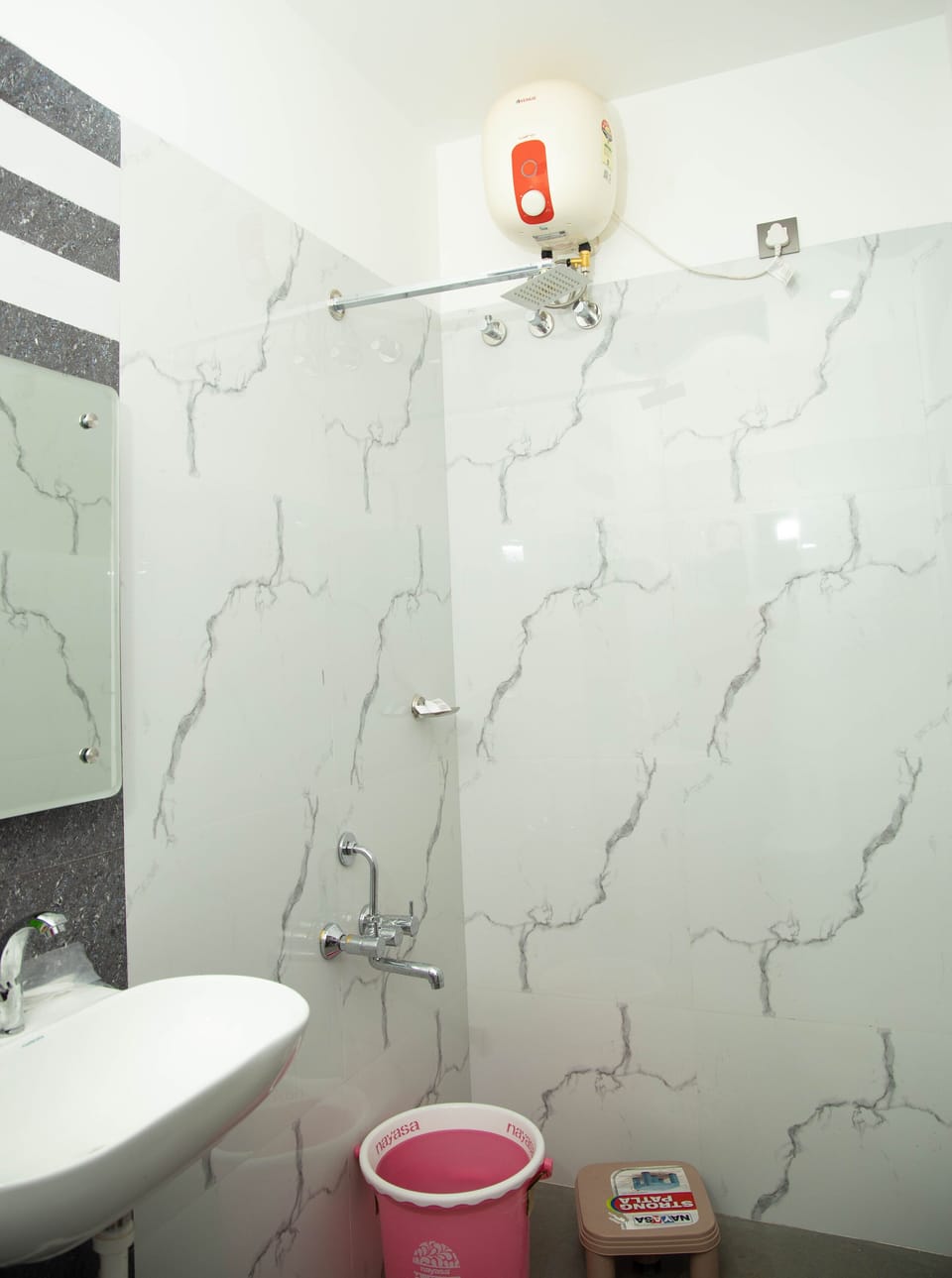 Deluxe Double Room (AC) | Bathroom | Shower, free toiletries, towels, soap