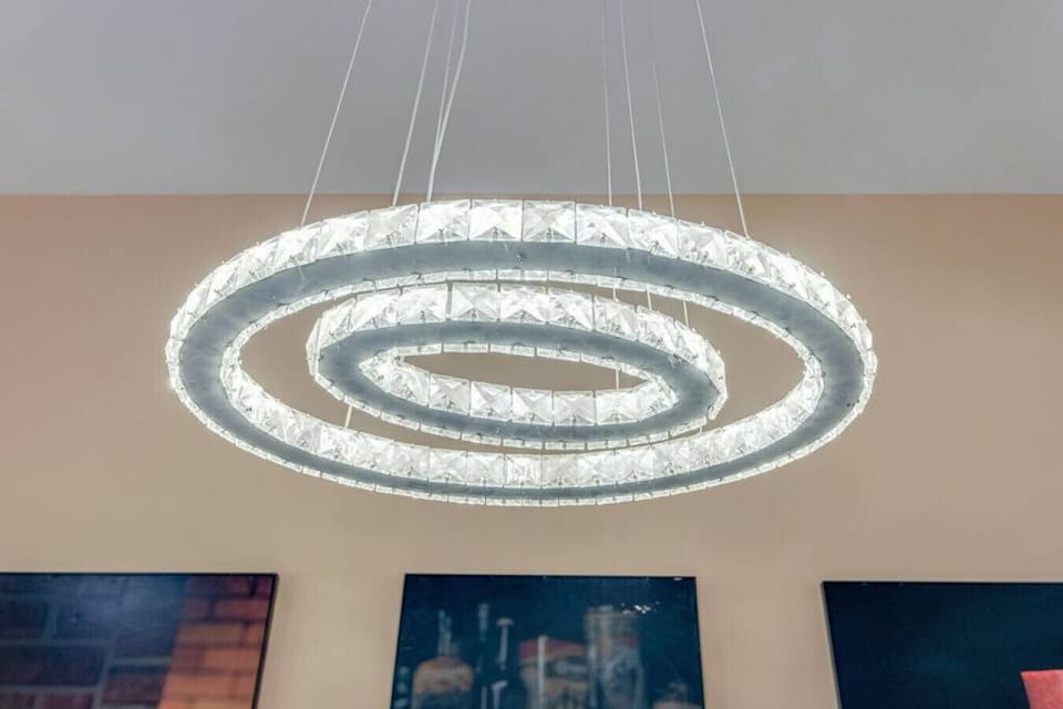 beautiful chandelier over dinning room table