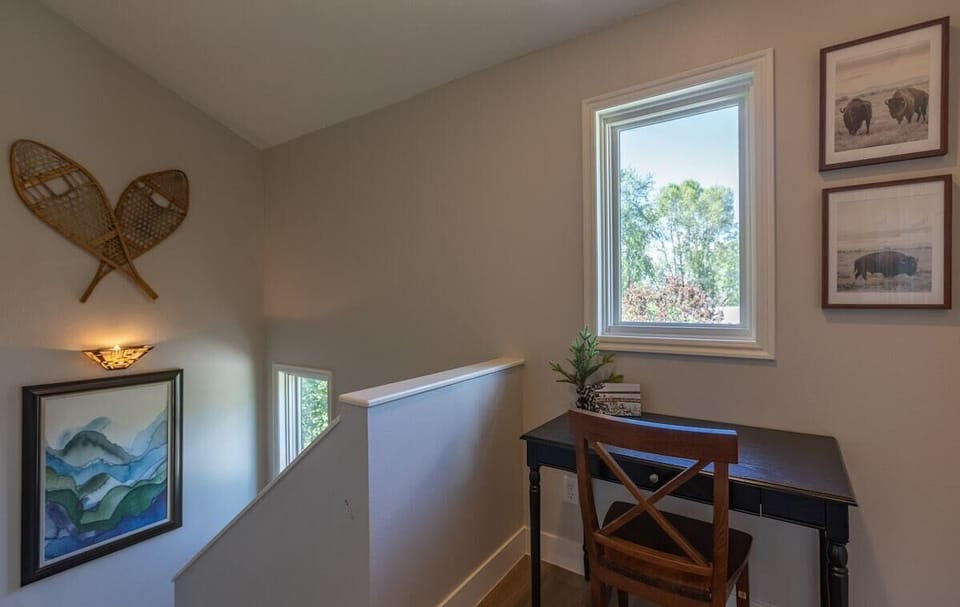 Desk tucked up on the second floor landing.