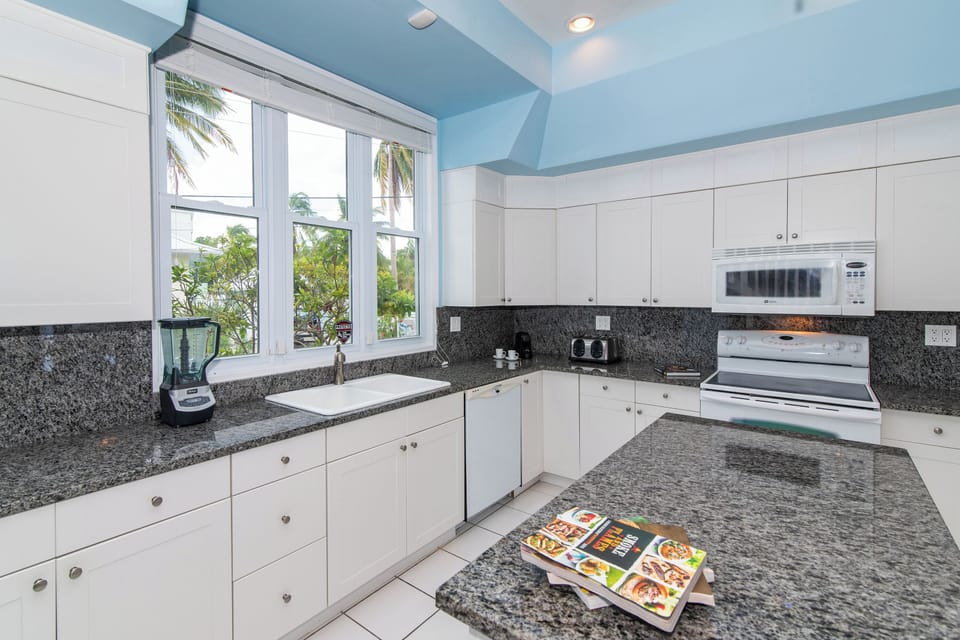 Full kitchen with appliances.