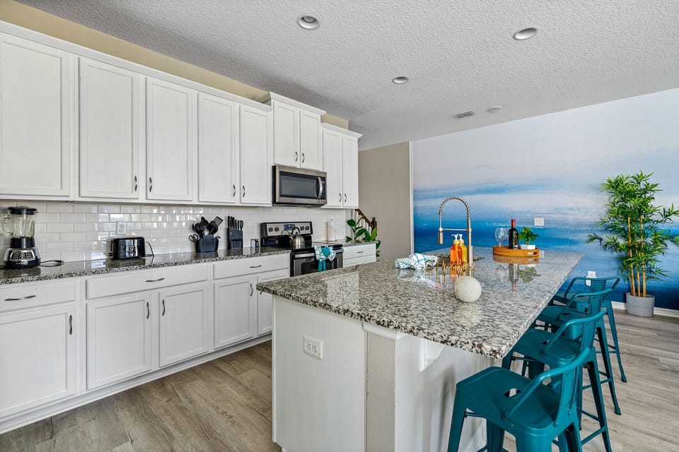 UPDATED gorgeous white kitchen fully stocked for your large group!