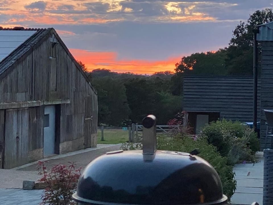 BBQ and sunset from Weaver's Cottage terrace - perfect