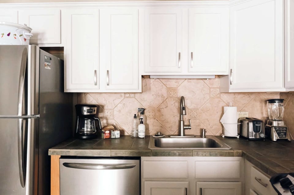 Stainless steel appliances are featured throughout