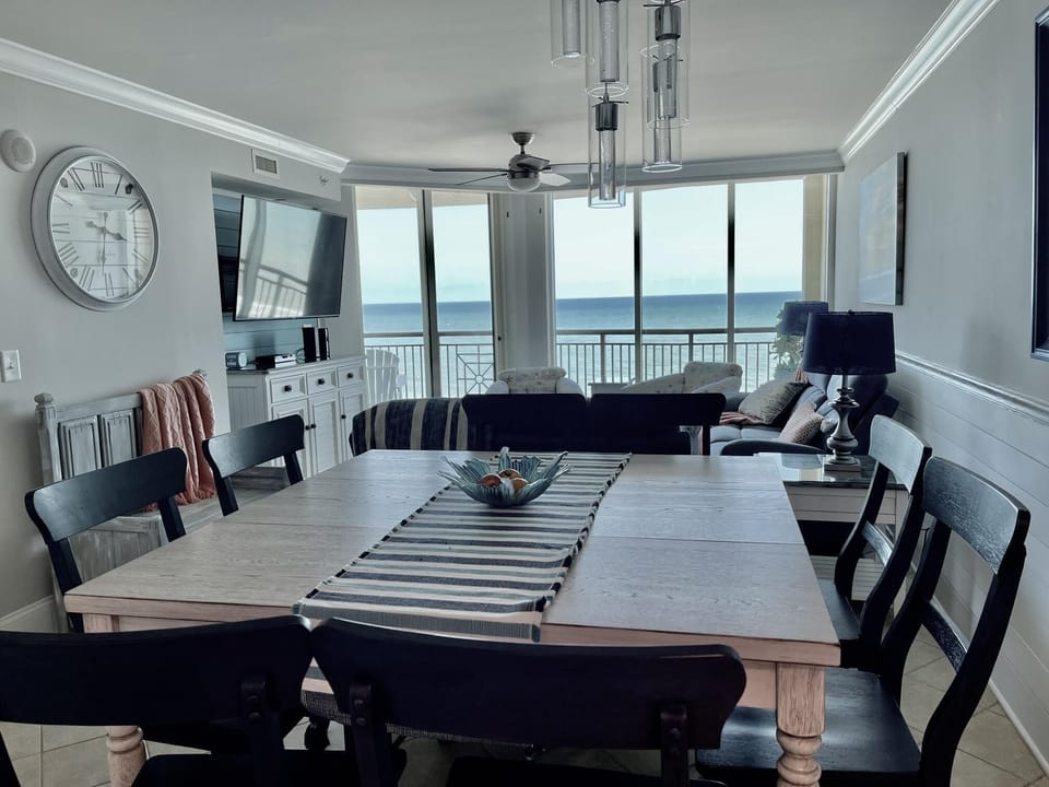 Spacious dining area with panoramic ocean views and natural light