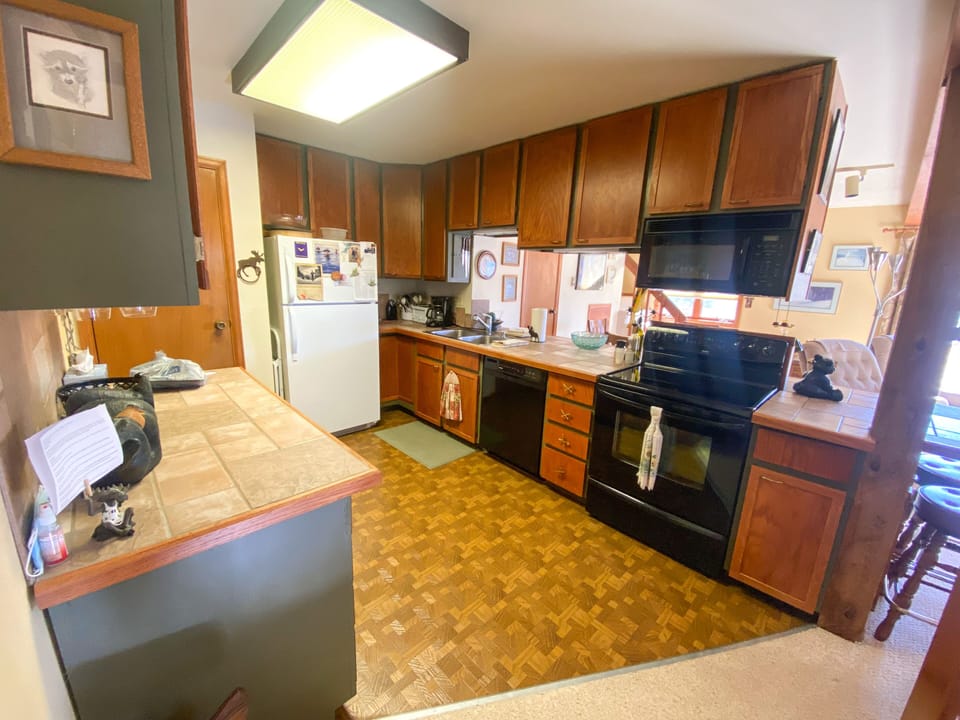 Kitchen - lots and lots of utensils and cookware. 