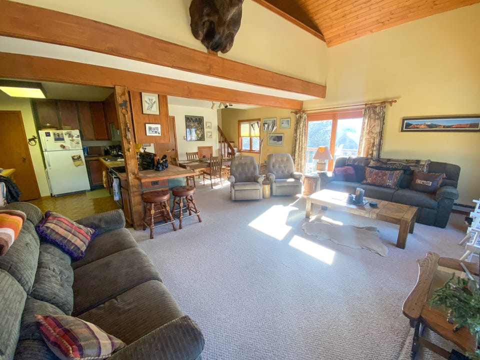 Living room with kitchen.