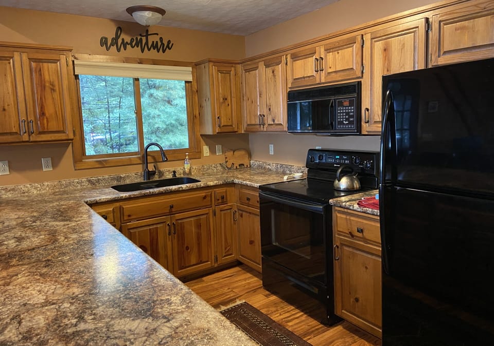 The Kitchen with a dining peninsula