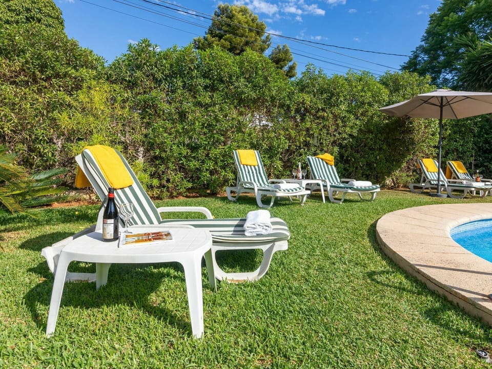 Sky, Plant, Furniture, Chair, Cloud, Tree, Outdoor Furniture, Outdoor Table, Sunlounger, Table
