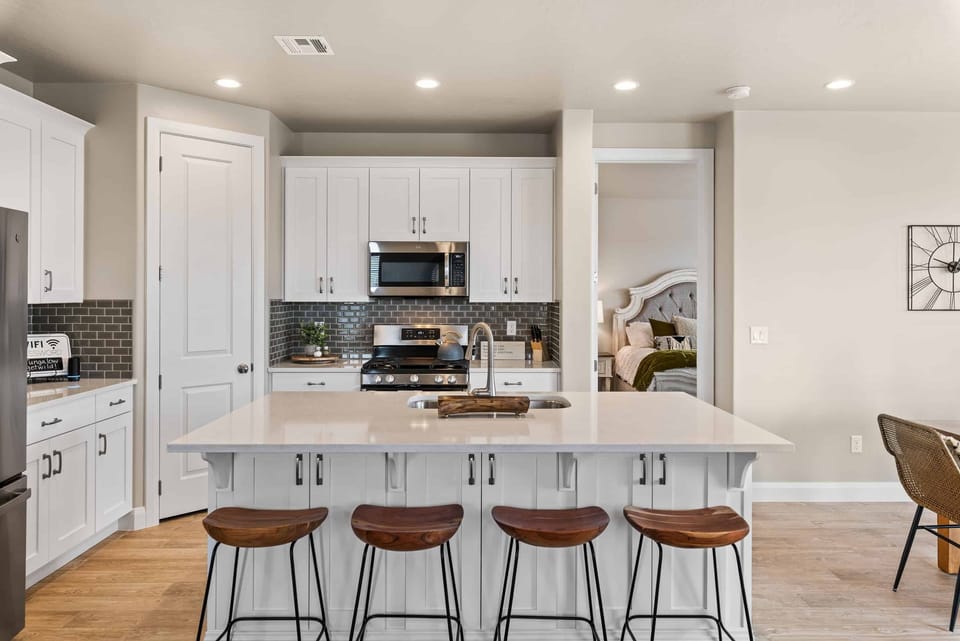 Townhome, 4 Bedrooms | Private kitchen | Coffee/tea maker, fridge, oven, toaster