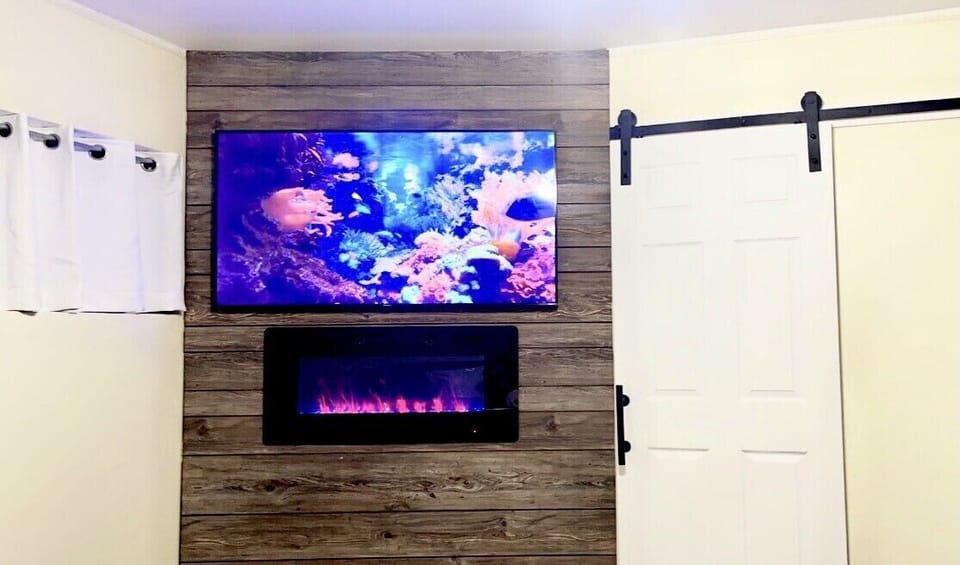 55” Roku TV & Electric Fireplace 