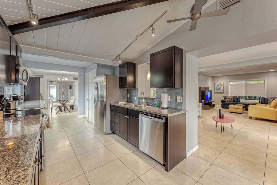 MAIN HOUSE KITCHEN #1- Fully Appointed Updated Kitchen with Stainless Steal Appliances (Microwave, Refrigerator, Ceramic Cooktop & Oven, Dishwasher, Toaster, Regular Drip Coffee Maker & Fully Stocked with Pots/Pans, Baking Pans, Dishware, Silverware 