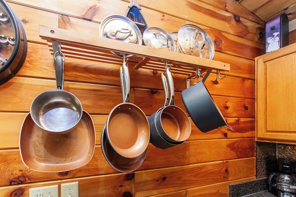 Hanging pots and pans add character to the full kitchen at Edgeview Chalet near Deep Creek.
