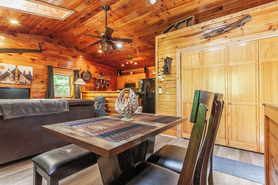 Spacious dining area connected to the living space at Edgeview Chalet in Bryson City.