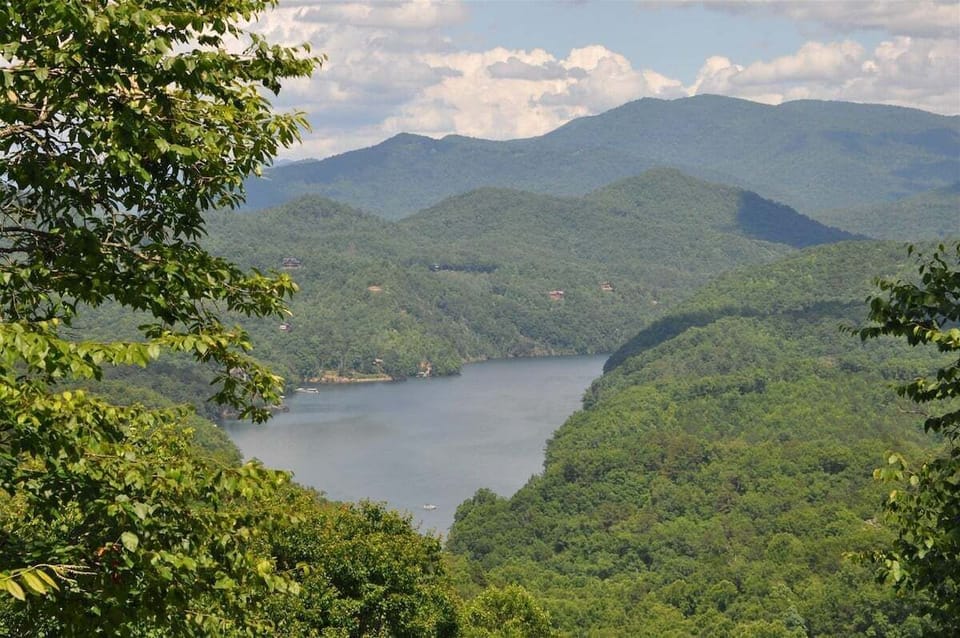 Expansive Lake Fontana and Smoky Mountain views from this Bryson City cabin retreat in Western North Carolina.