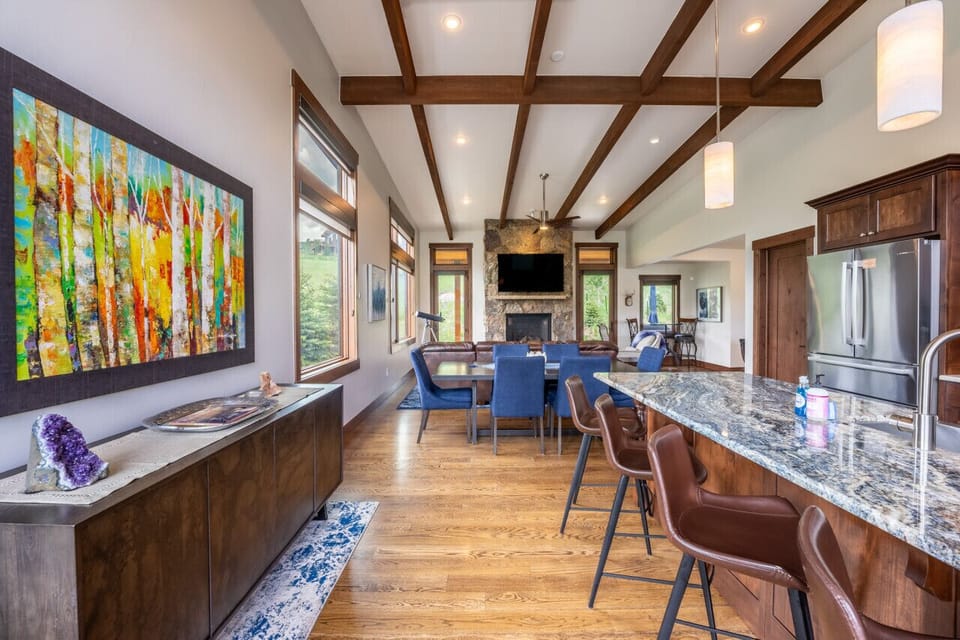 Open concept kitchen, dining and living areas