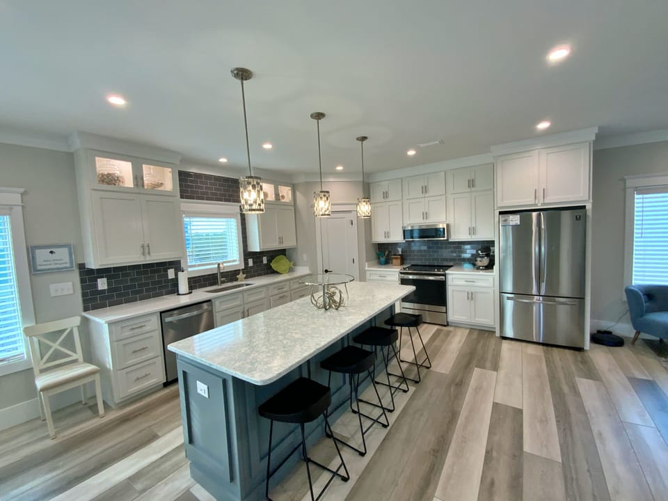 Large Kitchen - The refrigerator is conveniently located so that guests can help themselves to cold beverages without interrupting the chef.
