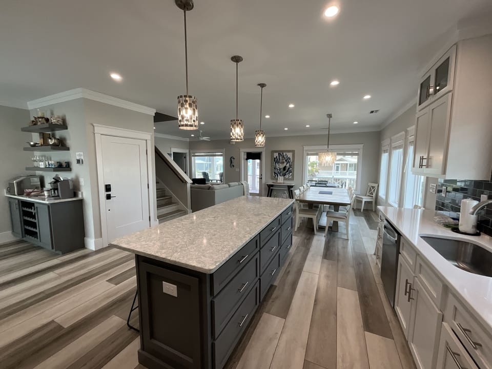 Chef’s Delight! - Quartz counter tops and stainless steel appliances are standout features of this modern kitchen.