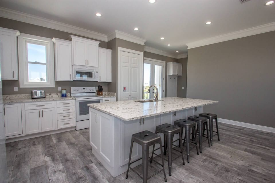 Modern Kitchen - Cooks love the granite countertops and stainless appliances.