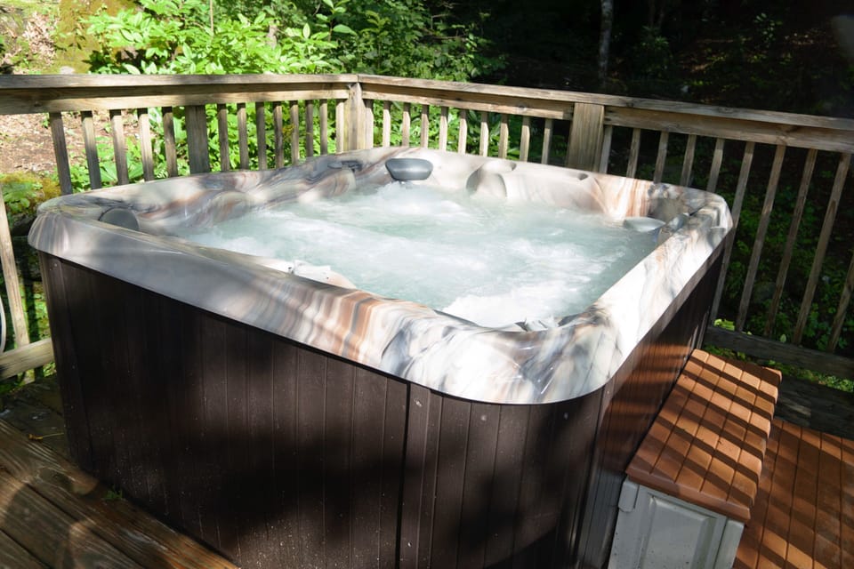 Sparkling hot tub beside the babbling creek