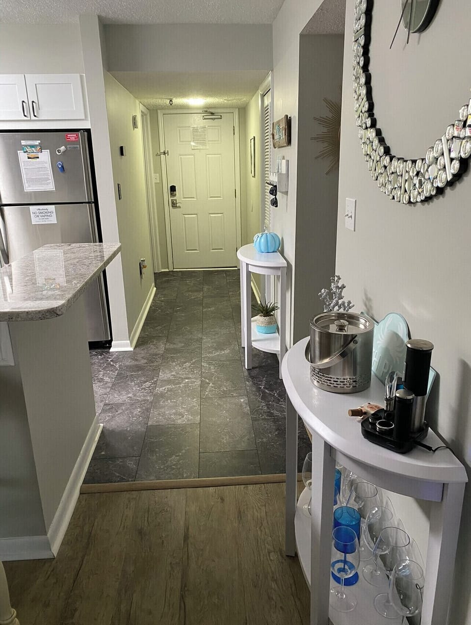 New flooring in laundry room, hallway +kitchen. Complete kitchen remodel 10/22