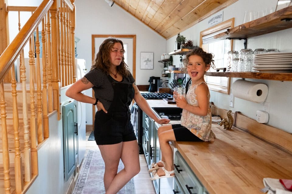 The kitchen has a full sized range, dishwasher, microwave, refrigerator, Nespresso, and more!