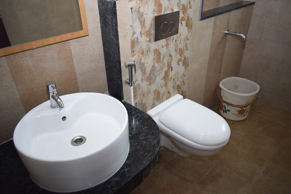 Standard Room (AC) | Bathroom | Shower, free toiletries, towels