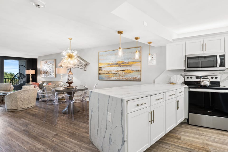 Fully equipped kitchen with modern appliances and all tools for cooking and baking.

Professionally Managed by
Breathe Easy Rentals