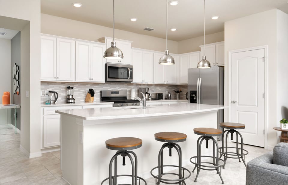 This bright and spacious kitchen will invite you to stay in and cook.