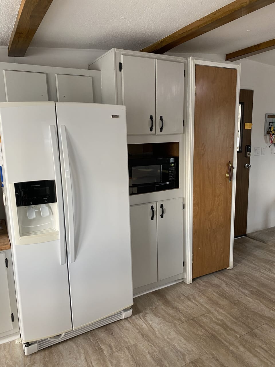 Full refrigerator, freezer, microwave, Oven, Keurig machine