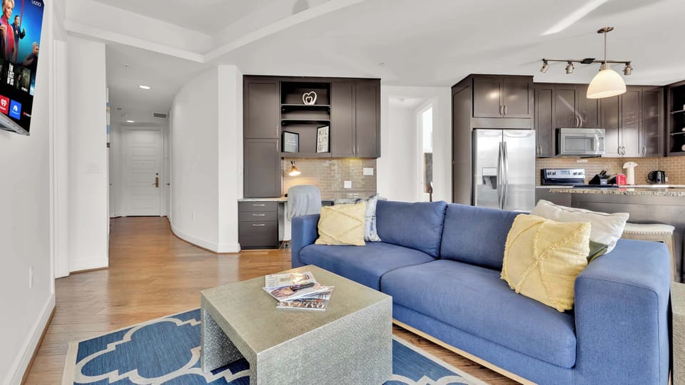 Living Room: Modern elegance meets comfort in this light-filled retreat with stylish decor!