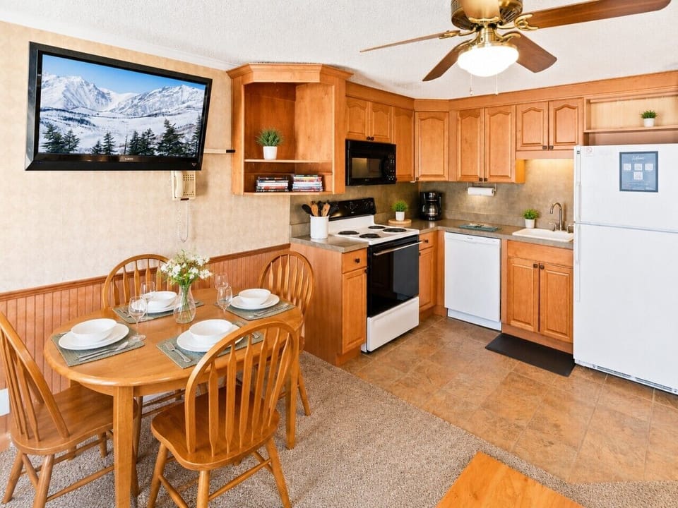 Remodeled kitchen is fully-equipped with pots, pans & utensils