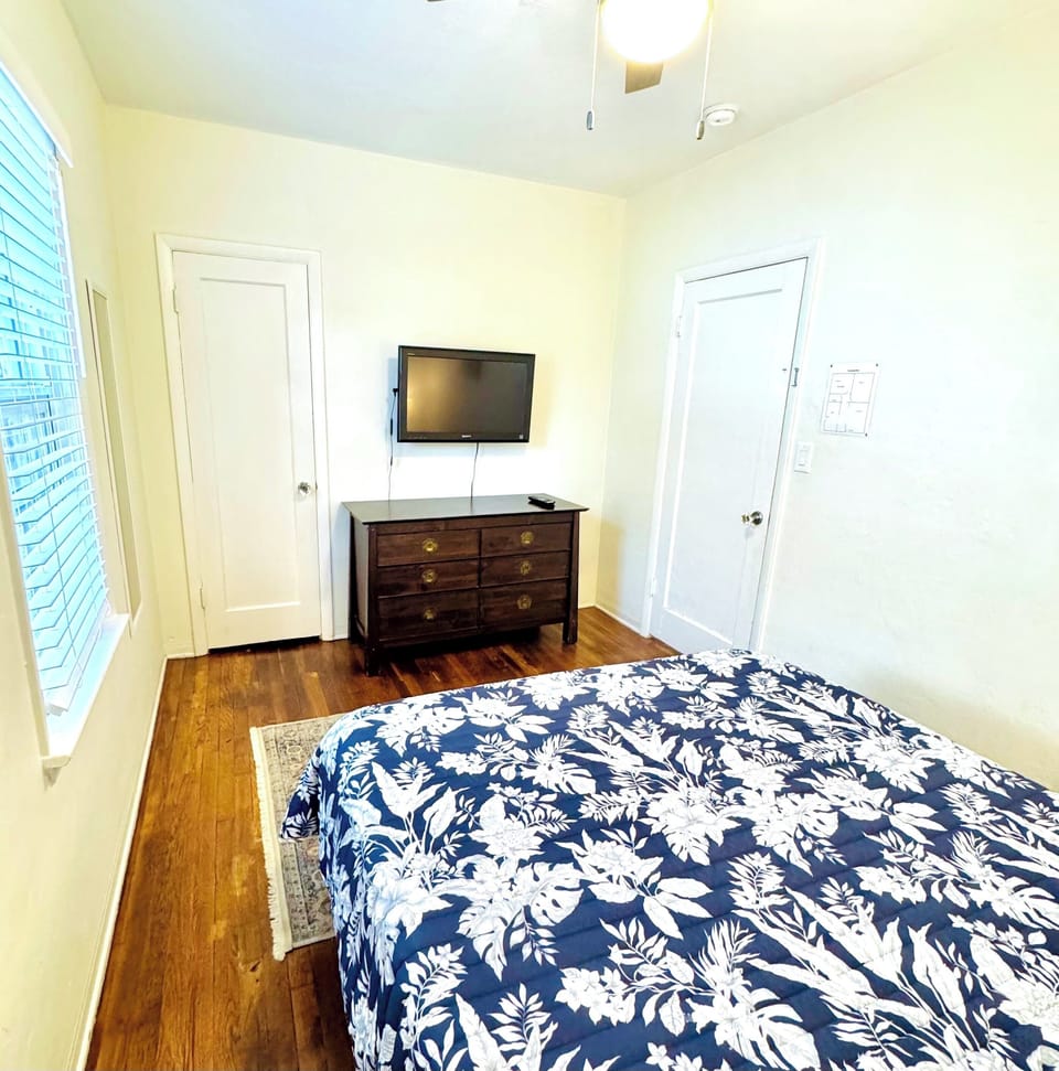 Second bedroom featuring a comfortable queen-size bed
