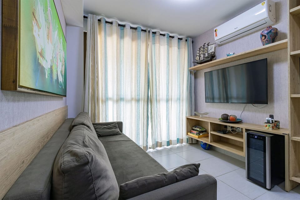 Deluxe Apartment | Living area | 42-inch Smart TV with digital channels