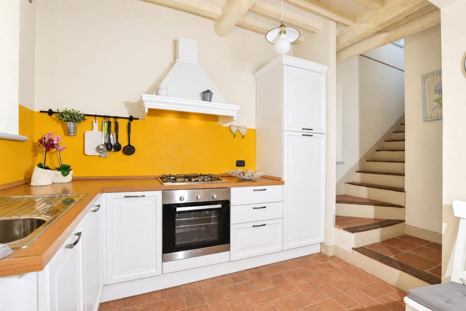Standard Apartment, 2 Bedrooms, Microwave, Mountainside (Ginepro Grillo) | Private kitchen | Coffee/tea maker, stovetop, dining table