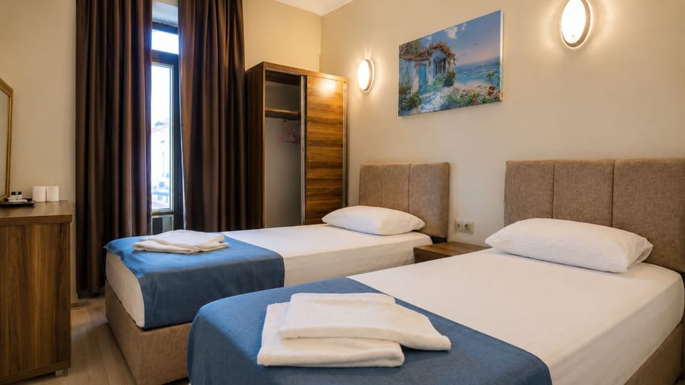 Standard Double Room, Balcony, Partial Sea View | WiFi (free), bed sheets