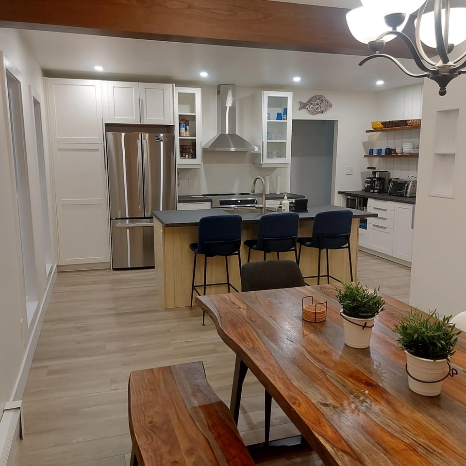 Coffee, bar and desk in kitchen with direct wired Internet.