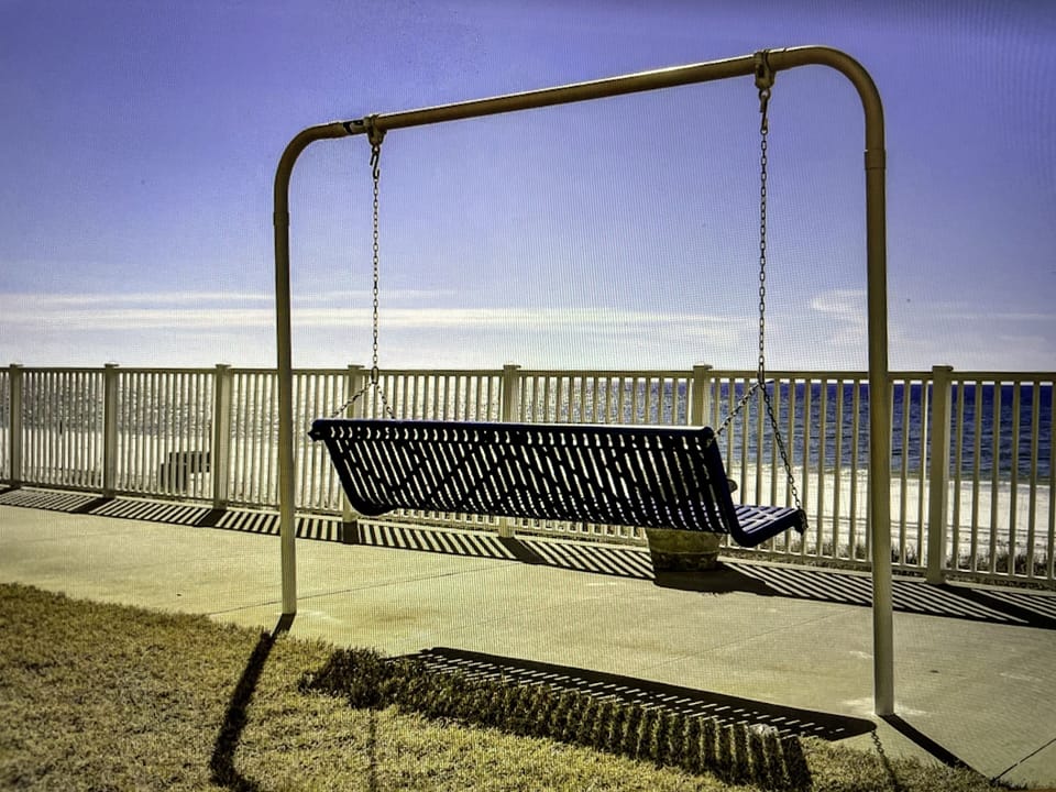 Sit down by the pool and swing while enjoying the ocean sound & view.